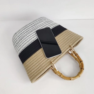 Bamboo handle cotton rope woven bag with black and white stripes and khaki accents