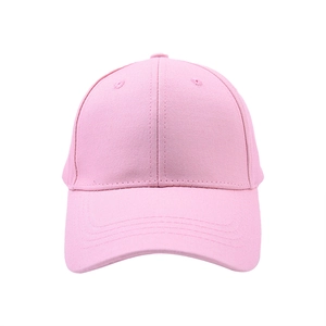 Close-up of pink cotton baseball cap showing 6-panel stitching and embroidery eyelets