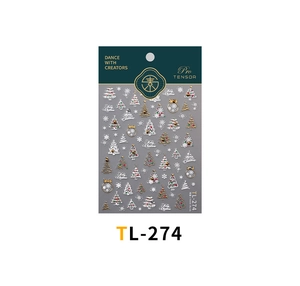 Detail of Christmas nail art stickers with snowflake and tree patterns on TL-274 sheet