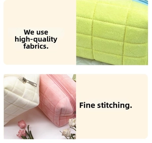 Detailed view of quilted plush pencil cases with soft texture and smooth metal zipper