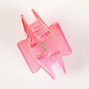 Pink translucent shell hair claw clip with colorful gradient and glossy finish