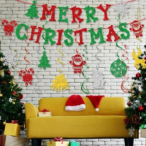Glittery Merry Christmas banner set with colorful hanging swirls and festive ornaments