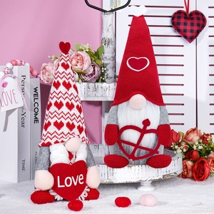 Valentine's Day faceless gnomes set with knitted hats and Cupid heart arrows