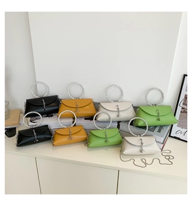 Chic jelly bags in multiple colors featuring rhinestone ring handles and chain straps