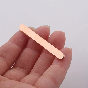 Macro shot of a 5mm rose gold stainless steel flat bar for DIY ring jewelry making