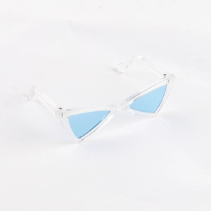 Detail of trendy pet sunglasses with blue triangular lenses and transparent frames