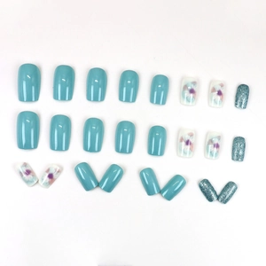 Short square light blue press-on nails with floral patterns and glitter finish