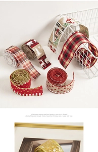 Detailed close-up of various Christmas ribbons with plaid, elk, and glitter patterns