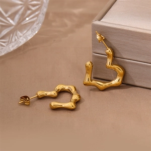 French style gold irregular wavy heart earrings in stainless steel with a liquid metal look