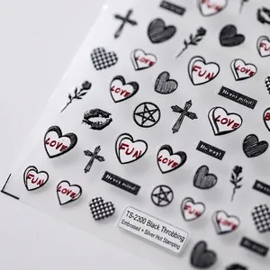 3D embossed nail art stickers with black hearts and gothic crosses on white background