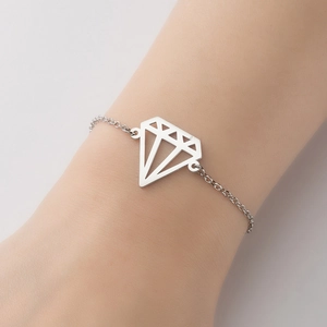 Minimalist silver-toned hollow origami diamond pendant bracelet on female wrist