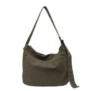 Large olive green canvas tote bag with adjustable shoulder strap and front pocket