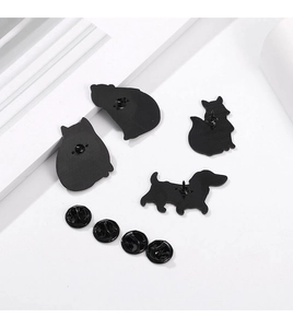 Detailed set of four black animal brooches featuring cat, fox, and dachshund dog shapes