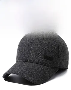 Close-up of windproof baseball cap featuring gray textured fabric and SPORT logo badge
