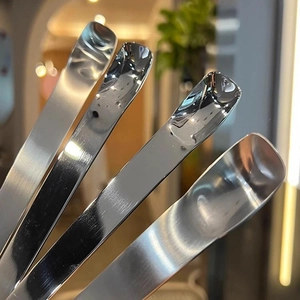 Polished stainless steel dessert spoons set with Nordic minimalist design and glossy finish