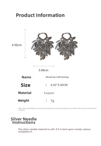 Detail view of silver leaf tassel earrings with size dimensions and copper material info