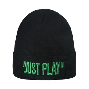 Detail of black knitted beanie featuring vibrant green JUST PLAY embroidery on the folded cuff