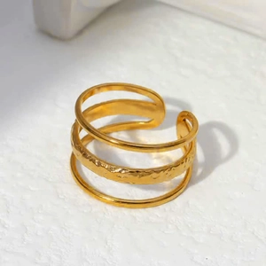 Minimalist gold wavy layered open ring with hammered texture detail for women
