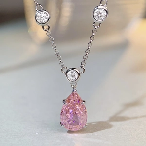 Elegant S925 sterling silver necklace with a pear-shaped pink gemstone and white zircons