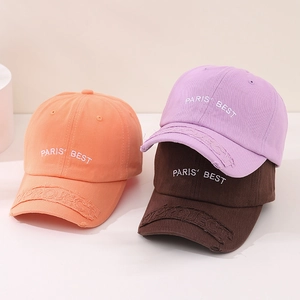 Kids cotton baseball caps with PARIS BEST embroidery in orange, purple and brown