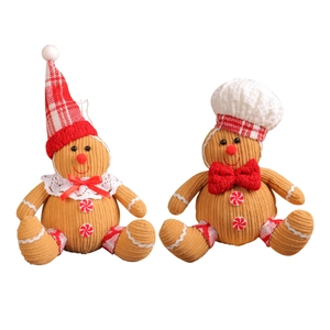Christmas gingerbread man plush charms with red bow ties for festive tree decoration
