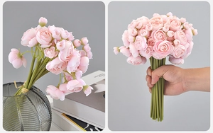 Detail of pink artificial silk ranunculus bouquet in a vase and handheld for scale