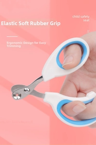 Detail of ergonomic pet nail clippers with stainless steel round hole blade and blue handle