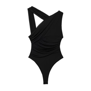 Detail of black one-shoulder bodysuit featuring ribbed texture and sheer mesh inserts