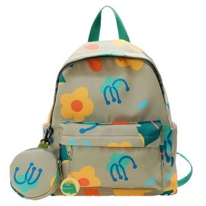 Cute beige floral kids backpack with green handle and dinosaur charm accessory