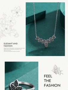 Detail view of silver leaf jewelry set with black zircon stones in elegant style