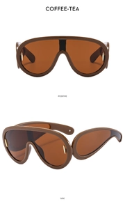 Front and side view of coffee-colored shield sunglasses with gold metallic accents