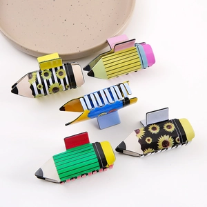 Pencil shaped hair claw clips with sunflower and striped patterns in various bright colors