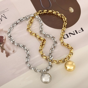 Golden and silver stainless steel chunky link chains with large polished sphere pendants