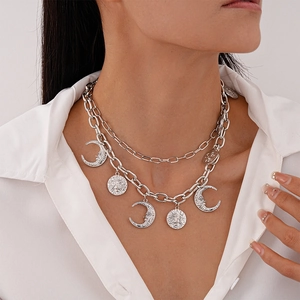 Silver double layer necklace with sun and moon carved charms in bohemian retro style