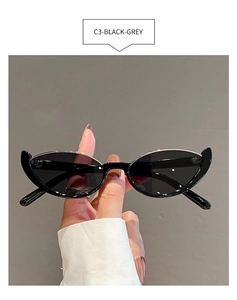 Detail of C3-Black-Grey cat eye sunglasses featuring metallic trim and grey lenses