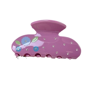 Violet acetate hair claw clip with blue flowers, green leaves and sparkling rhinestones
