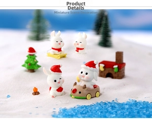 Miniature Christmas resin rabbit set with sled and tree in a micro snowy landscape scene