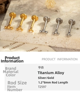 Macro shot of titanium labret studs in gold and silver with three-ball cluster design
