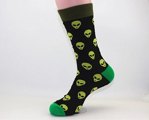 Detail of crew socks with green alien pattern and contrast heel and toe colors
