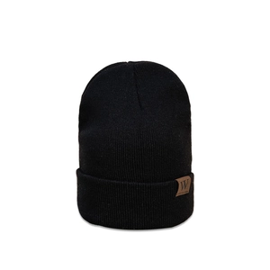 Close-up of the black knit beanie featuring a brown leather patch with a letter W logo