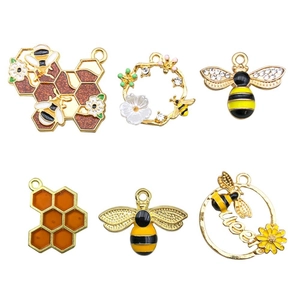 Set of 6 cute alloy bee and honeycomb charms with yellow enamel and white rhinestones