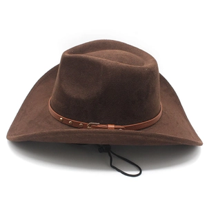 Detail of dark brown faux suede cowboy hat with leather band and gold stud accents