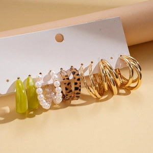 10-piece set of acrylic pearl leopard print earrings in green and gold on white card