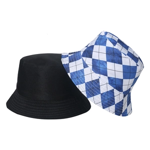 Detail of solid black and blue geometric rhombus pattern bucket hats with reinforced stitching
