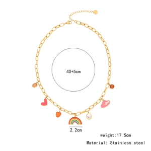 Detail view of rainbow heart charms on gold stainless steel chain with size measurements