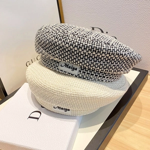Chic women's tweed beret hats in black-white plaid and beige with side label detail
