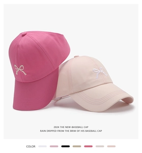 Detail of bow embroidery on breathable cotton summer baseball caps in multiple colors