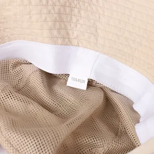 Detail of 100% nylon inner lining with breathable mesh and white elastic sweatband