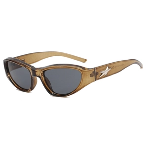 Vintage Y2K steampunk cat-eye sunglasses in transparent tea color with star detail