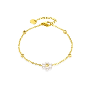 Elegant gold flower bracelet featuring white pearls and a delicate adjustable chain